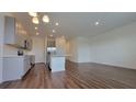 Spacious kitchen features a large island, stainless steel appliances, and ample counter space at 1429 Discovery St, Davenport, FL 33896