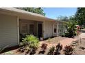 Inviting outdoor patio with comfortable seating and lush greenery, perfect for relaxation at 954 N Texas Ave, Orlando, FL 32804