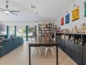 Open living space with a large dining table and ample shelving, creating an inviting and functional area at 1064 Universal Rest Pl, Kissimmee, FL 34744