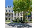 Charming townhome with a well-maintained front yard and a classic facade at 1521 Chatfield Pl, Orlando, FL 32814