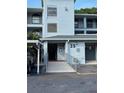 Condo building entrance with a ramp and assigned parking at 25306 Northlake Dr # 25306, Sanford, FL 32773