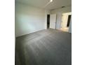 Neutral bedroom with carpet and closet at 33836 Sky Blossom Cir, Leesburg, FL 34788