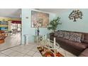 Bright living room showcasing tile floors and decorative accents at 2933 N Chickasaw Trl, Orlando, FL 32817