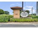 Entrance to Fountain Parke at Lake Mary featuring a tiled entrance and manicured landscaping at 524 Lobelia Dr, Lake Mary, FL 32746