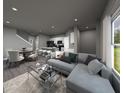 Open concept floor plan with living room, kitchen, dining area, recessed lighting, and natural light at 4533 Cross Prairie Pkwy, St Cloud, FL 34772