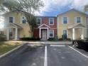 Townhouse featuring ample parking and low-maintenance landscaping at 4650 Staghorn Dr # 500, Orlando, FL 32808