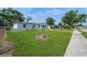Well-maintained home with a large yard and mature trees at 4816 Crow St, Orlando, FL 32819