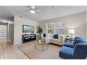 Bright living room with stylish furniture, decorative accents, and tile flooring at 614 Plum Ln, Altamonte Springs, FL 32701