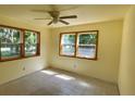 Bright bedroom with natural light and classic tiled flooring at 714 Herbert St, Port Orange, FL 32129