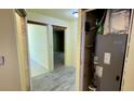 Interior shot showcasing the home's HVAC system and fresh flooring at 714 Herbert St, Port Orange, FL 32129