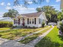 Charming home with a landscaped front yard, and long driveway at 2505 Amherst Ave, Orlando, FL 32804