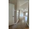 Inviting living room featuring tile floors, high ceilings, and a ceiling fan at 1715 Redfin Way, Kissimmee, FL 34759