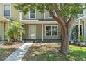 Inviting two-story home exterior featuring a covered entrance and well-maintained landscaping at 283 Woodgreen Ln, Winter Springs, FL 32708
