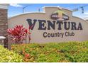Ventura Country Club community sign surrounded by lush landscaping and tropical foliage at 3900 Southpointe Dr # 127, Orlando, FL 32822
