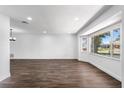 Open floor plan with recessed lighting, wood flooring, and bay window at 611 Lakespur Ln, Altamonte Springs, FL 32714