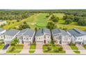 Desirable neighborhood features modern homes with golf course views and lush landscaping at 8833 Cruden Bay Ct, Davenport, FL 33896