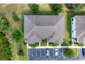 Overhead view of the townhome's roof, with designated parking and well-maintained green spaces at 316 Primrose Dr, Davenport, FL 33837