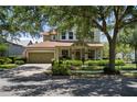 Charming two-story home with a well-manicured lawn and inviting curb appeal at 402 S Lake Victoria Cir, Deland, FL 32724