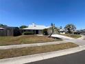 Quaint single Gathering home with well manicured front lawn on a sunny day at 549 Silvergate Loop, Lake Mary, FL 32746