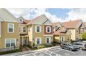 Attractive two-story townhouse with front-entry parking at 7572 Sunny Dreams Ln, Kissimmee, FL 34747
