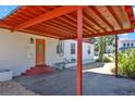 Close-up of the home's covered carport, showcasing the entry door at 1705 Virginia Dr, Orlando, FL 32803