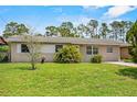 Well-kept lawn and clean exterior create an inviting curb appeal at 245 Amador Cir, Orlando, FL 32810