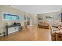 Spacious living room with hardwood floors and neutral paint at 750 W May St, Deland, FL 32720