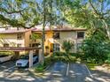 Beautiful condo with covered parking and mature landscaping at 2945 Lake Pineloch Blvd # 18-26, Orlando, FL 32806