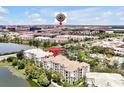 Aerial view of 4114 Breakview #307, near Epic Universe and surrounding condos, water, and cityscape at 4114 Breakview Dr # 30702, Orlando, FL 32819