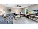 Comfortable living room with neutral tones and an abundance of natural light at 117 Georgetown Dr # C, Casselberry, FL 32707