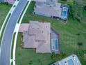 Aerial view of the house and pool, showcasing the property's layout and surroundings at 16768 Sanctuary Dr, Winter Garden, FL 34787