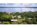 Aerial view of property near Lake Butler and Disney World surrounded by lush green landscape at 3443 Wild Myrtle Ct, Windermere, FL 34786