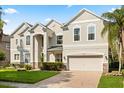 Charming two-story home with an attached two-car garage and brick-paved driveway at 3868 Whitewood Ct, Oviedo, FL 32766