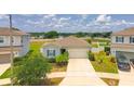 Aerial view showcasing the home's placement in a well-kept neighborhood at 600 Buchannan Dr, Davenport, FL 33837