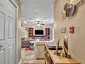 Inviting living room featuring artful decor, comfortable furniture, and plenty of natural light at 3715 S Lake Orlando Pkwy # 11, Orlando, FL 32808