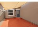 Private outdoor patio with sunshade and concrete flooring at 1013 Inlet Way, Altamonte Springs, FL 32714