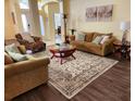 Inviting living room featuring hardwood floors and stylish decor at 236 Boxwood Dr, Davenport, FL 33837