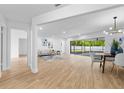 Bright and airy living space with modern lighting and a seamless transition to the outdoor patio at 2903 Clear Way, Orlando, FL 32805