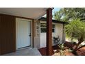 Inviting front porch with updated lighting and design elements at 1011 W 16Th St, Sanford, FL 32771