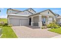 Beautiful home with a spacious driveway and attached two-car garage at 16013 Silver Brook Way Way, Winter Garden, FL 34787
