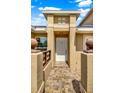Well-maintained front entrance with decorative tiling leading to the unit's front door and porch at 3249 Sandy Shore Ln, Kissimmee, FL 34743