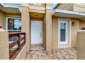 Inviting front porch with tiled flooring and a well-lit entrance with clear unit numbering at 3249 Sandy Shore Ln, Kissimmee, FL 34743