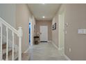 Charming two-story home with landscaped yard and gray color at 3715 Lana Ave, Davenport, FL 33897