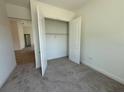 Bedroom closet showcasing ample storage space and a well-organized layout at 931 Azalea Walk Cir, Deland, FL 32724