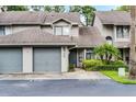 Townhouse with attached garage and well maintained landscaping at 179 Crown Point Cir, Longwood, FL 32779