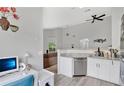 Stylish kitchen featuring stainless steel appliances, granite countertops and a modern design at 9616 River Walk Ct, Orlando, FL 32825