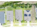 Aerial view of property showing lot lines and proximity to neighbors and surrounding area at 14325 Hidden Ct, Clermont, FL 34711