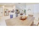 Open concept living space featuring a large kitchen, tile floors and neutral colors at 15303 Sw 52Nd Cir, Ocala, FL 34473