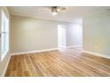 Bright living room featuring new flooring, fresh paint, and ample natural light at 1229 Deneece Ter, Daytona Beach, FL 32117
