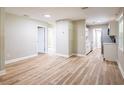 Spacious room showcasing the open layout, leading to the kitchen with new appliances at 1229 Deneece Ter, Daytona Beach, FL 32117